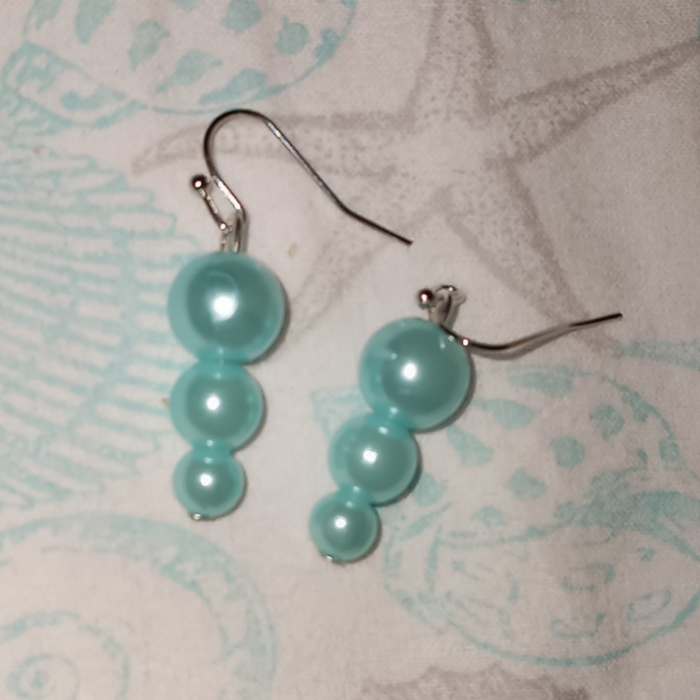 Hand Crafted essential baby blue unicorn pearl earrings